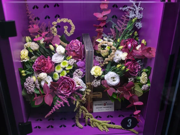 Bouquets in a flower vending compartment